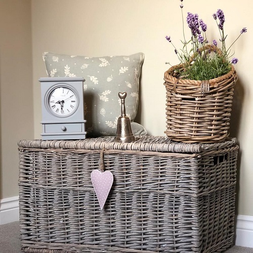 lavender in woven basket on table
